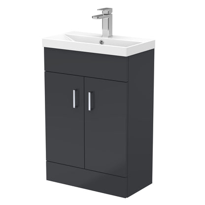 A black compact vanity unit with a thin edge basin, featuring two doors and a silver faucet.