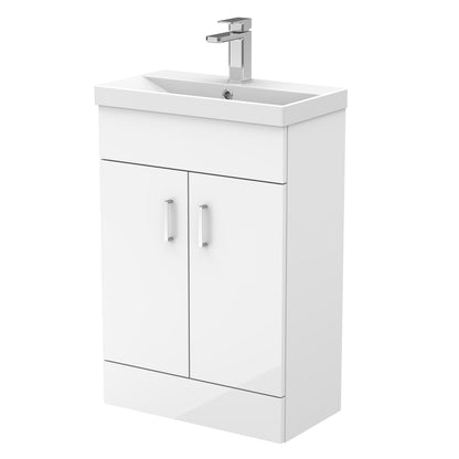 A white compact vanity unit with a thin edge basin, featuring two doors and a silver faucet.