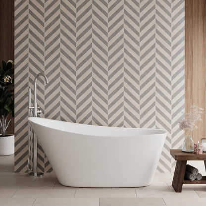 A slipper freestanding bath in a bathroom setting with a white color and end waste position.