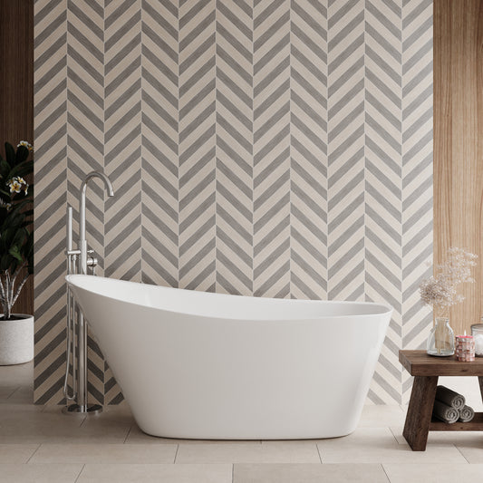 A slipper freestanding bath in a bathroom setting with a white color and end waste position.