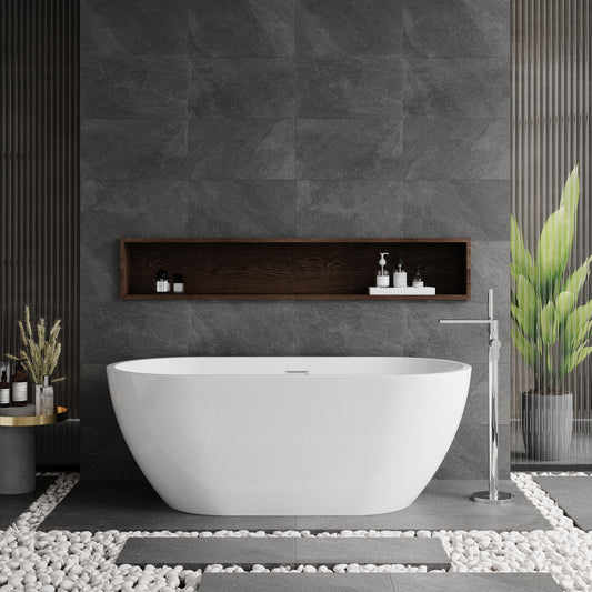 An oval freestanding white bathtub positioned in a bathroom with dark gray walls, a ceiling-mounted dark wood shelf above it, and a floor-standing tap to the right.
